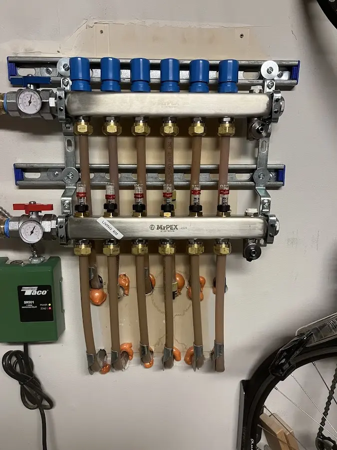 Plumber performing Water Heater Repair at a residential property in Algonquin